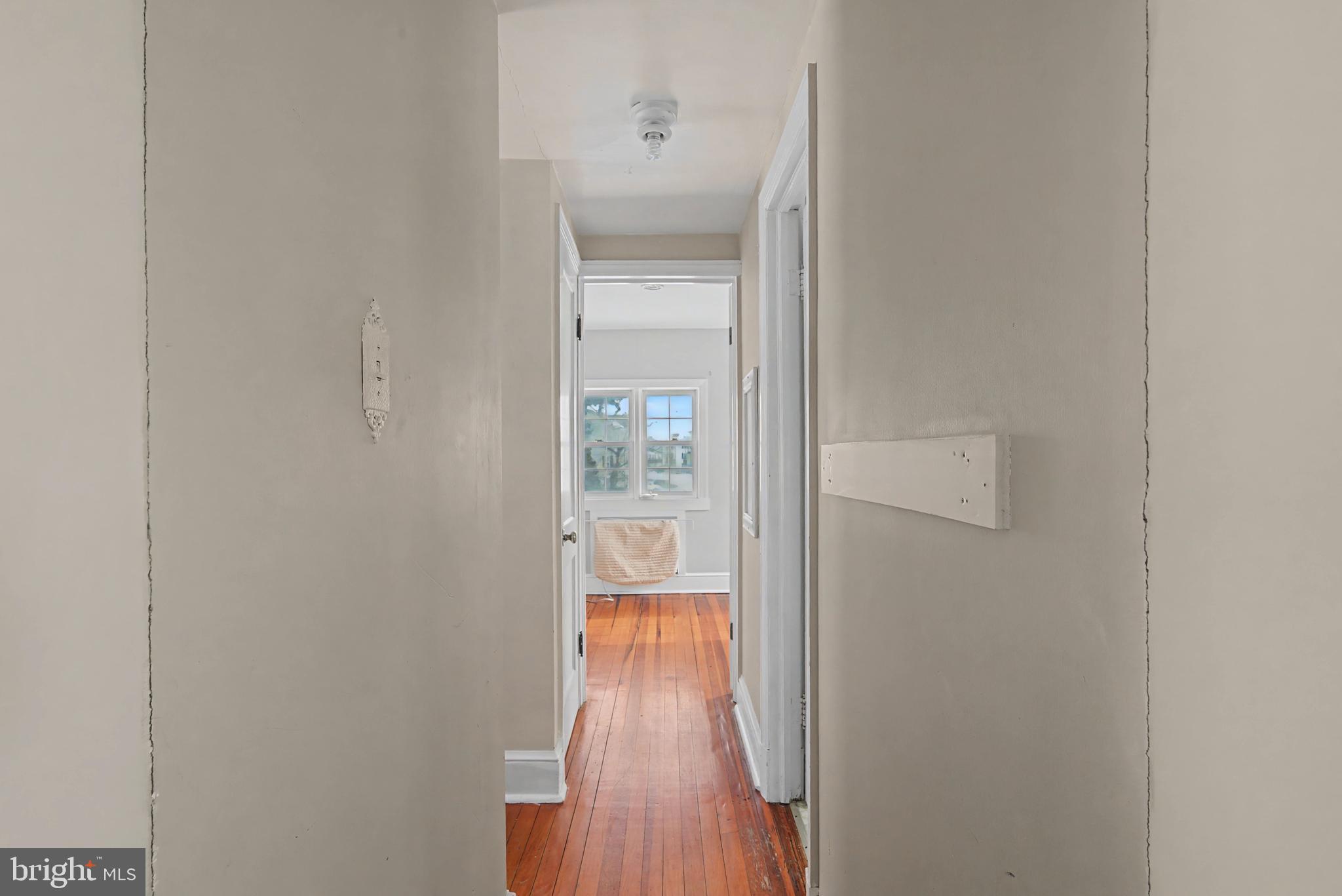 1776 Atlas Drive Frederick, MD 21702 - Photo 38 of 54 a view of a hallway with wooden floor