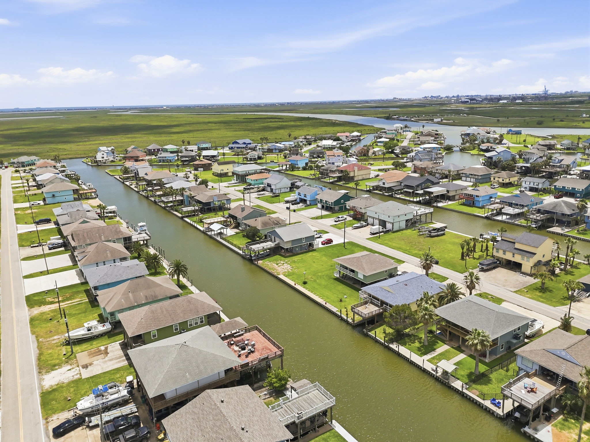 119 Sand Shoals Road Freeport, TX 77541 - Photo 30 of 34 Subdivision aerial — Hide-A-Way on the Gulf canal grid showing the home's position within the established canal community, with marsh reserve to the north.