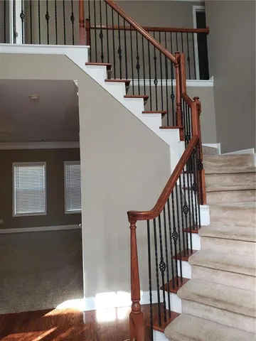 a view of entryway with wooden floor