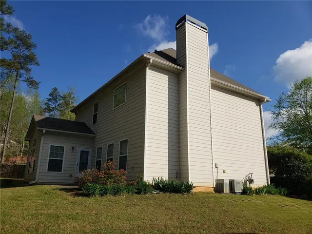 a view of a backyard of a house
