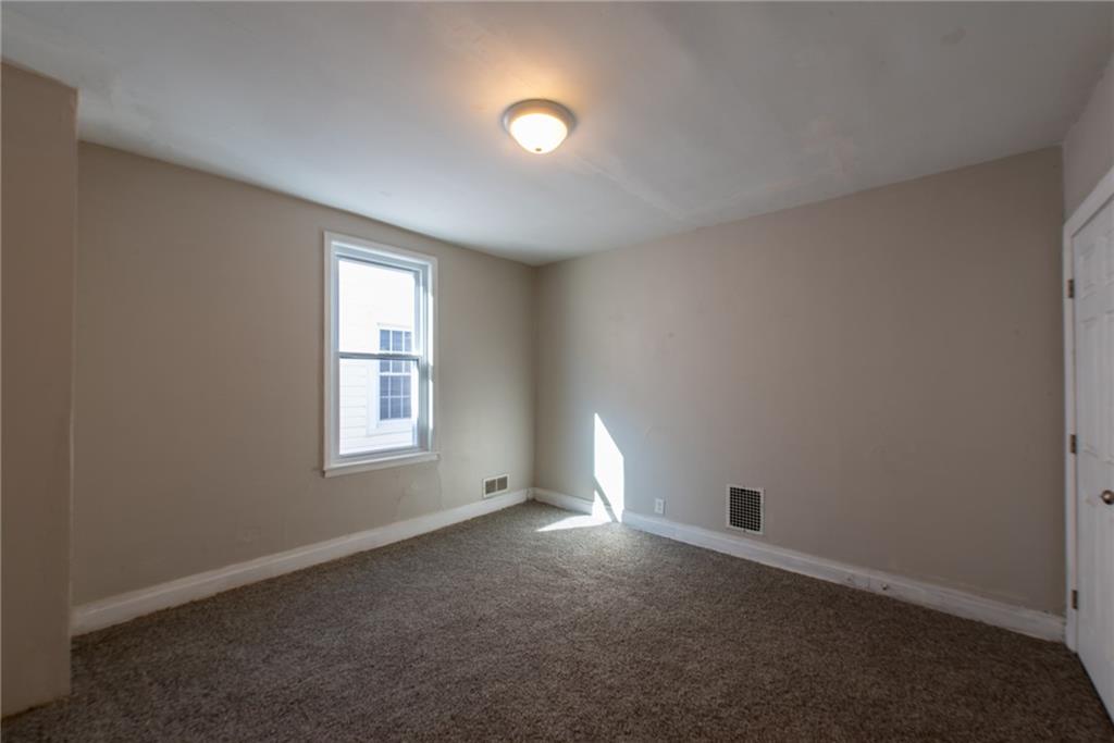 112 Farragut Avenue Vandergrift, PA 15690 - Photo 21 of 36 an empty room with windows and closet
