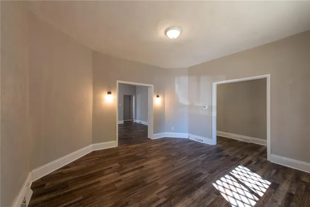 a view of entryway with wooden floor