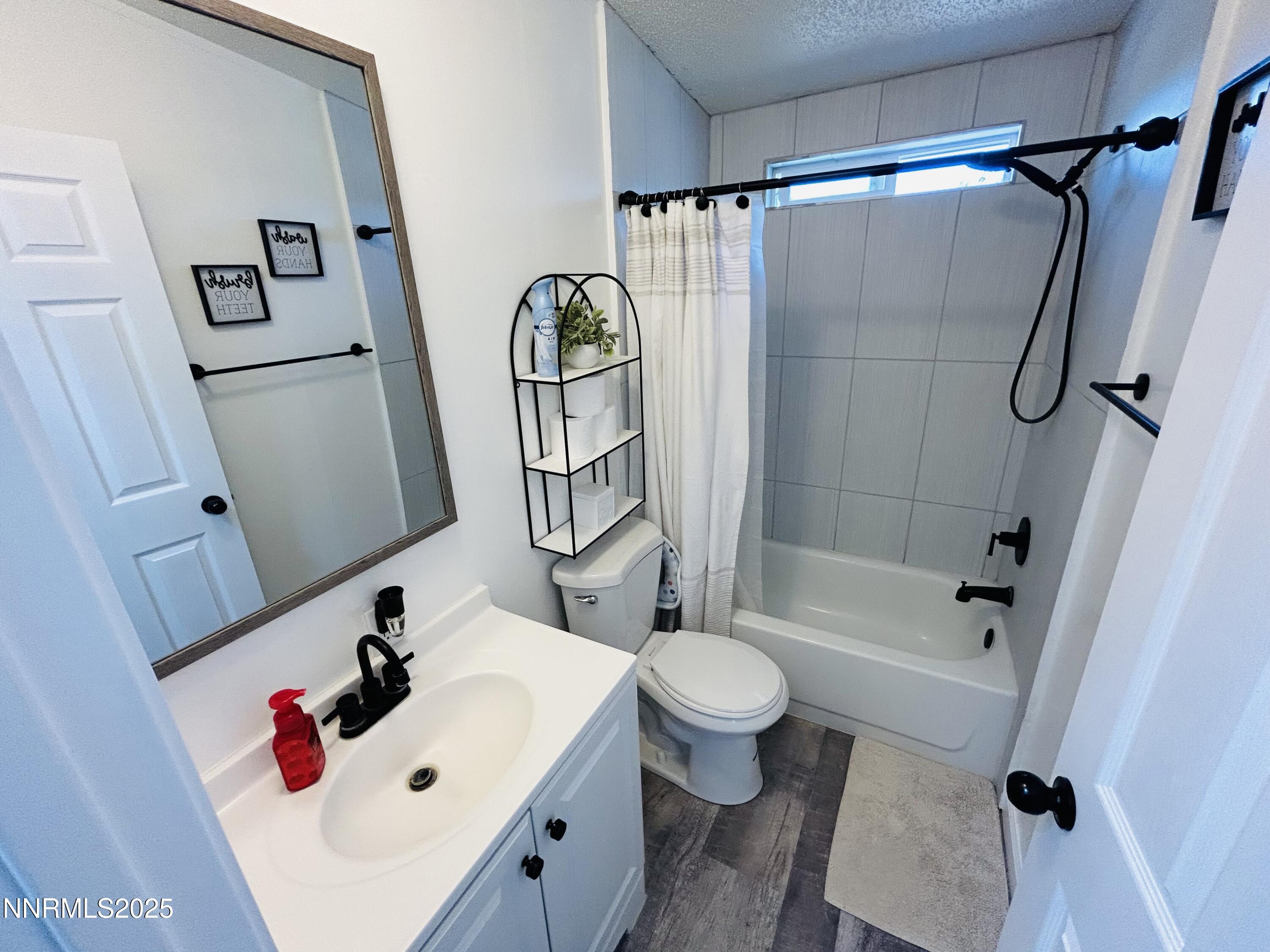 16 Stope Road Dayton, NV 89403 - Photo 12 of 21 a bathroom with a sink toilet and shower