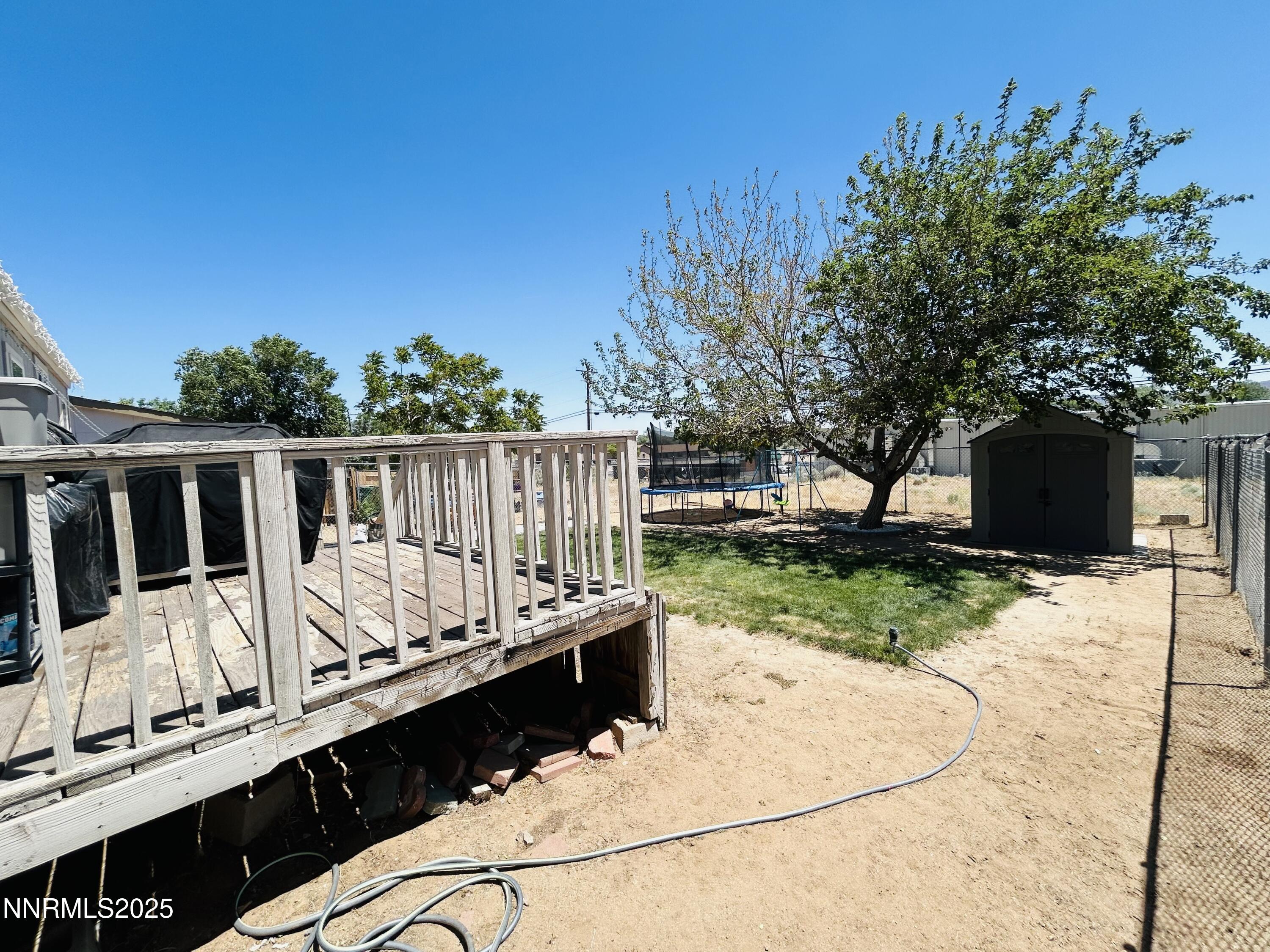 16 Stope Road Dayton, NV 89403 - Photo 20 of 21 a view of balcony with wooden floor and outdoor seating