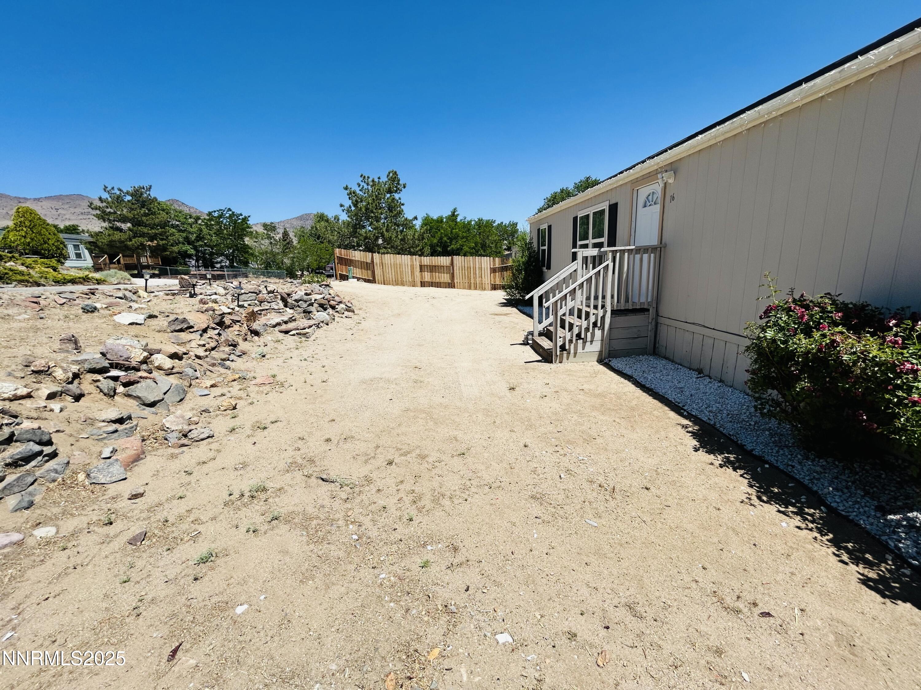 16 Stope Road Dayton, NV 89403 - Photo 3 of 21 a view of a backyard of the house