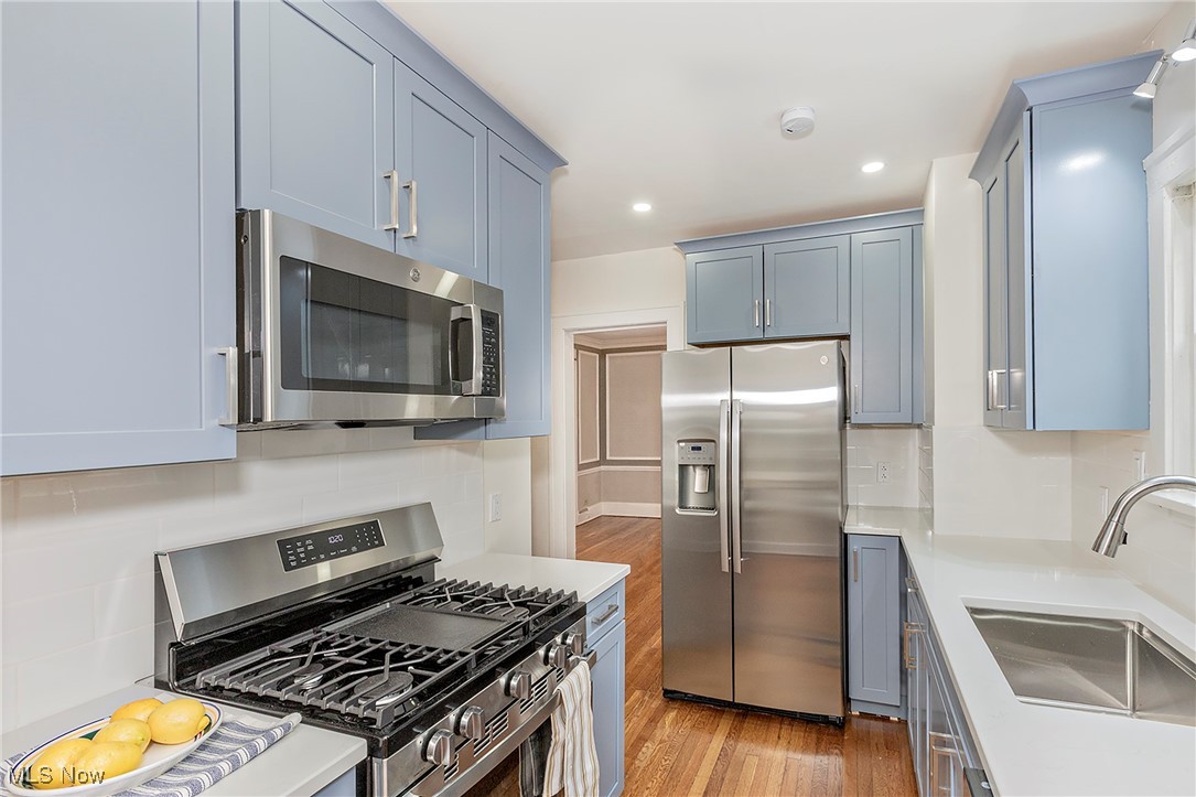 3366 Clarendon Road Cleveland, OH 44118 - Photo 17 of 50 New stainless steel appliances, deep sink too!
