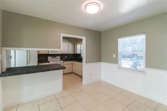 a large kitchen with cabinets
