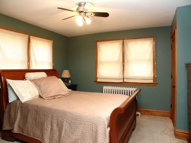 376 Addison Road Riverside, IL 60546 - Photo 13 of 18 a bedroom with a bed and window