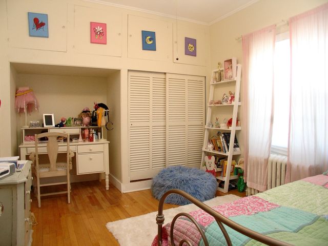 376 Addison Road Riverside, IL 60546 - Photo 14 of 18 a room with furniture a rug and a window