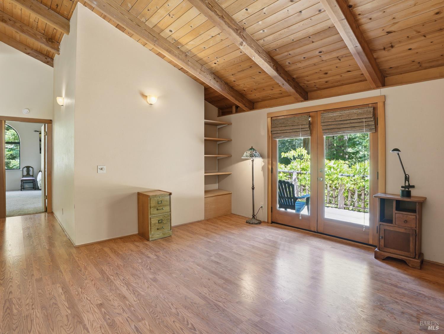 31397 Seaview Road Cazadero, CA 95421 - Photo 17 of 47 a view of a big room with wooden floor and a kitchen
