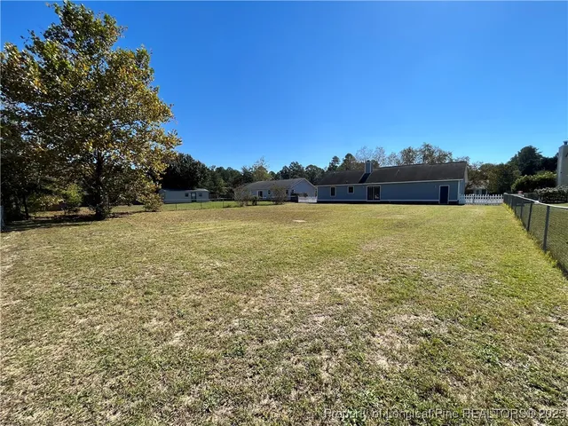 a view of outdoor space and yard