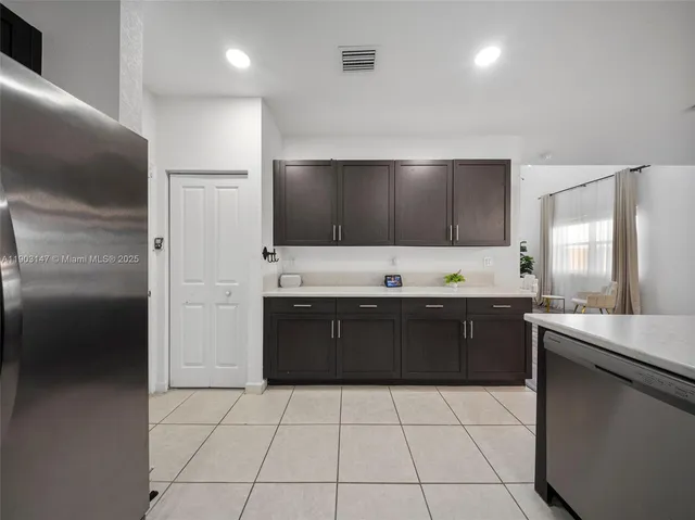 a bathroom with a toilet a sink and shower