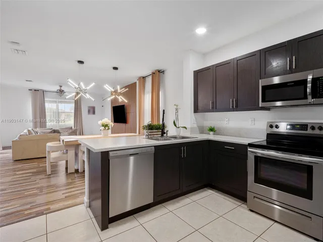 a bathroom with a double vanity sink toilet and a mirror