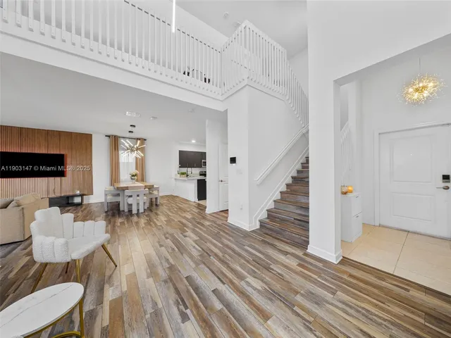 a bathroom with a double vanity sink mirror and toilet