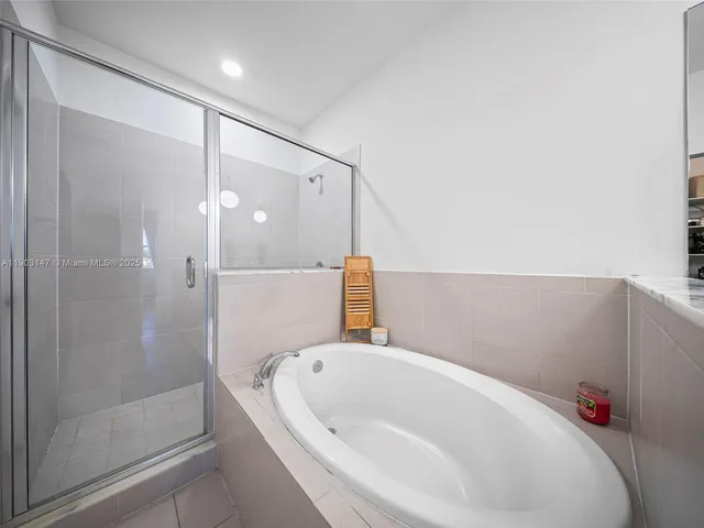 a view of a house with brick walls and a pathway