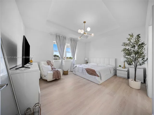 an aerial view of a house with a garden