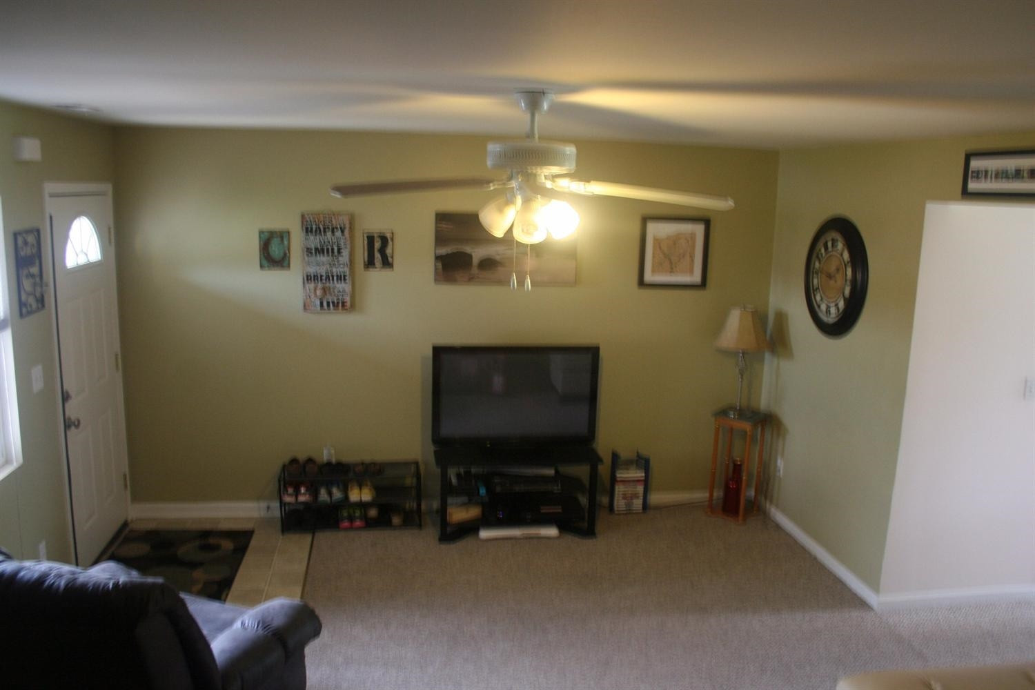 365 B South Boo Road Burns Harbor, IN 46304 - Photo 5 of 10 a view of a livingroom with furniture and a fan