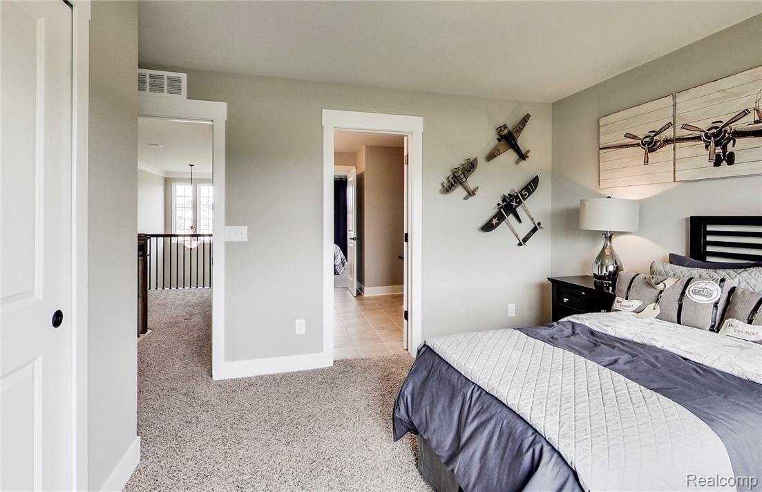 1009 Prescott Drive Rochester, MI 48309 - Photo 20 of 20 Parkside - MI - Woodside hr - 1920x1240 (39).jpg