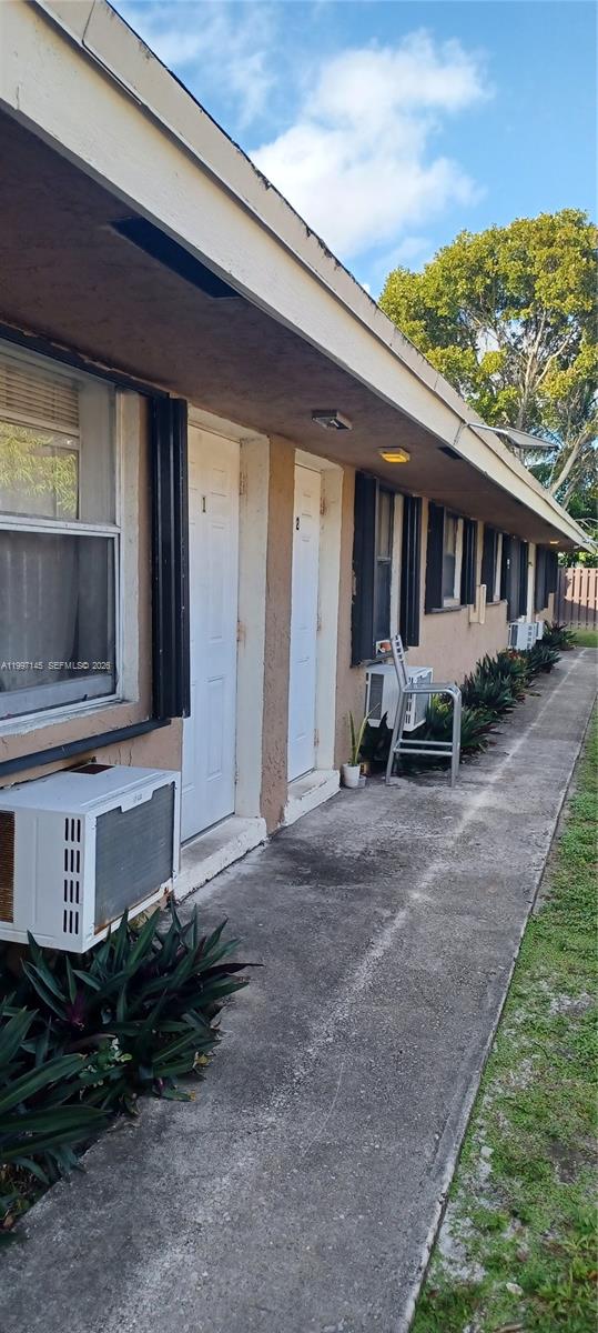 237 Southwest 5th Street Deerfield Beach, FL 33441 - Photo 11 of 11 a view of a house with a small yard and plants