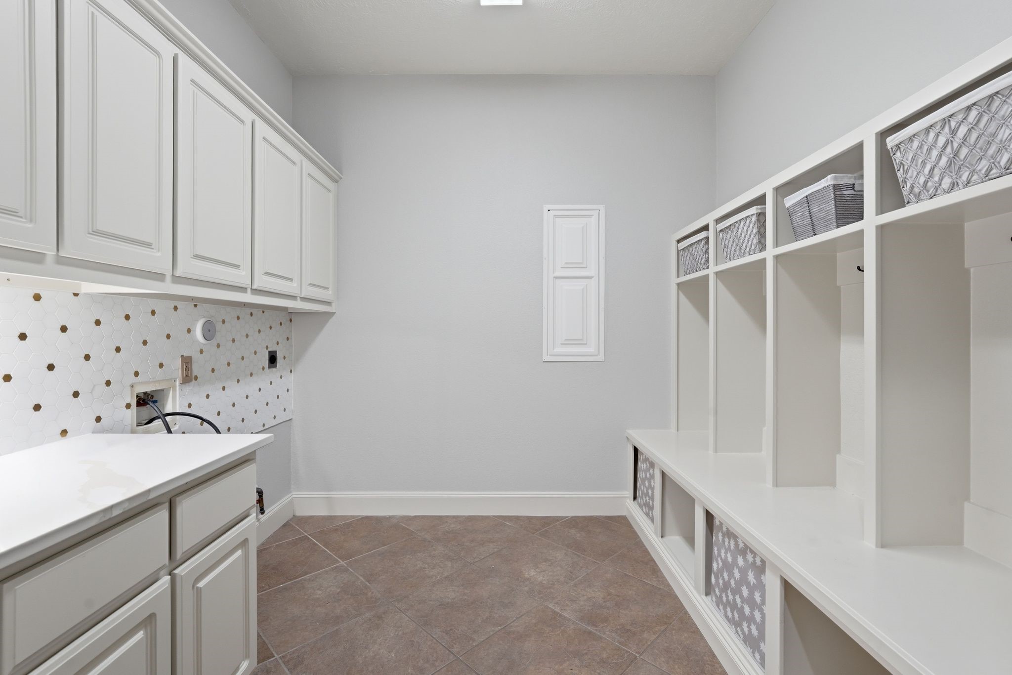 7603 Hogan Bridge Court Spring, TX 77389 - Photo 25 of 50 Well-designed laundry space with generous counter space, storage cabinetry, and a dedicated mud area to keep daily routines running smoothly.