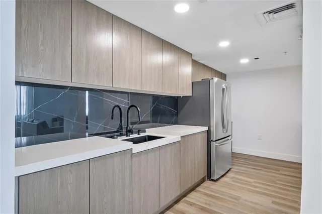 a bathroom with a shower and a toilet