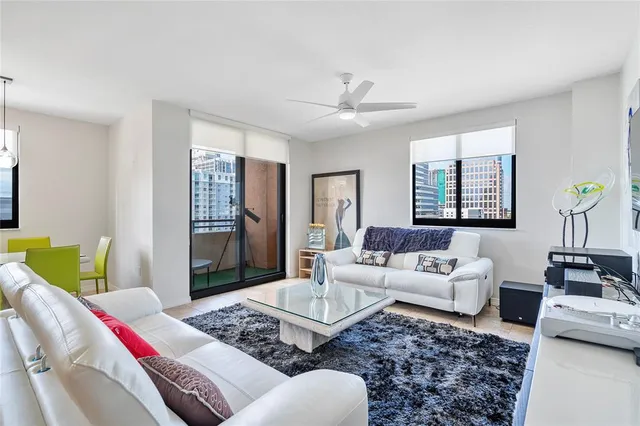 a living room with furniture and a window