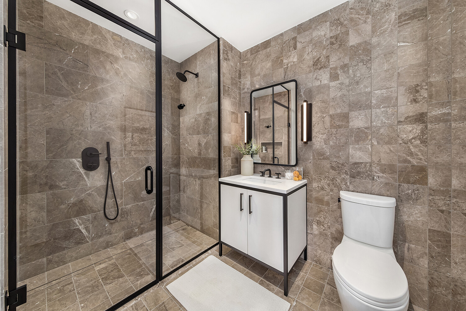 29 Huron Street, Unit PHCW Brooklyn, NY 11222 - Photo 5 of 20 a bathroom with a toilet sink and shower