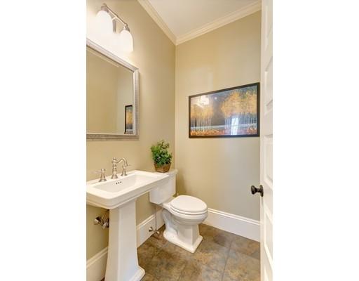 106 Day Street Newton, MA 02466 - Photo 12 of 30 a bathroom with a toilet a sink and mirror