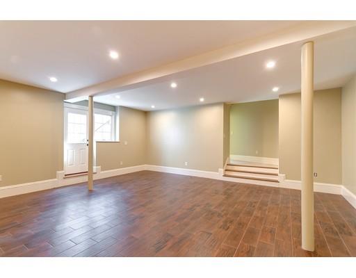 106 Day Street Newton, MA 02466 - Photo 26 of 30 a view of an empty room with wooden floor and a window