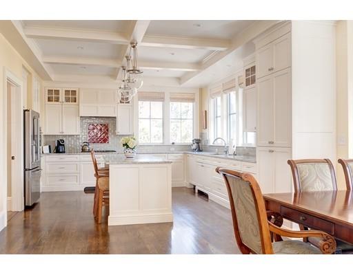 106 Day Street Newton, MA 02466 - Photo 9 of 30 a living room with kitchen island furniture and a chandelier