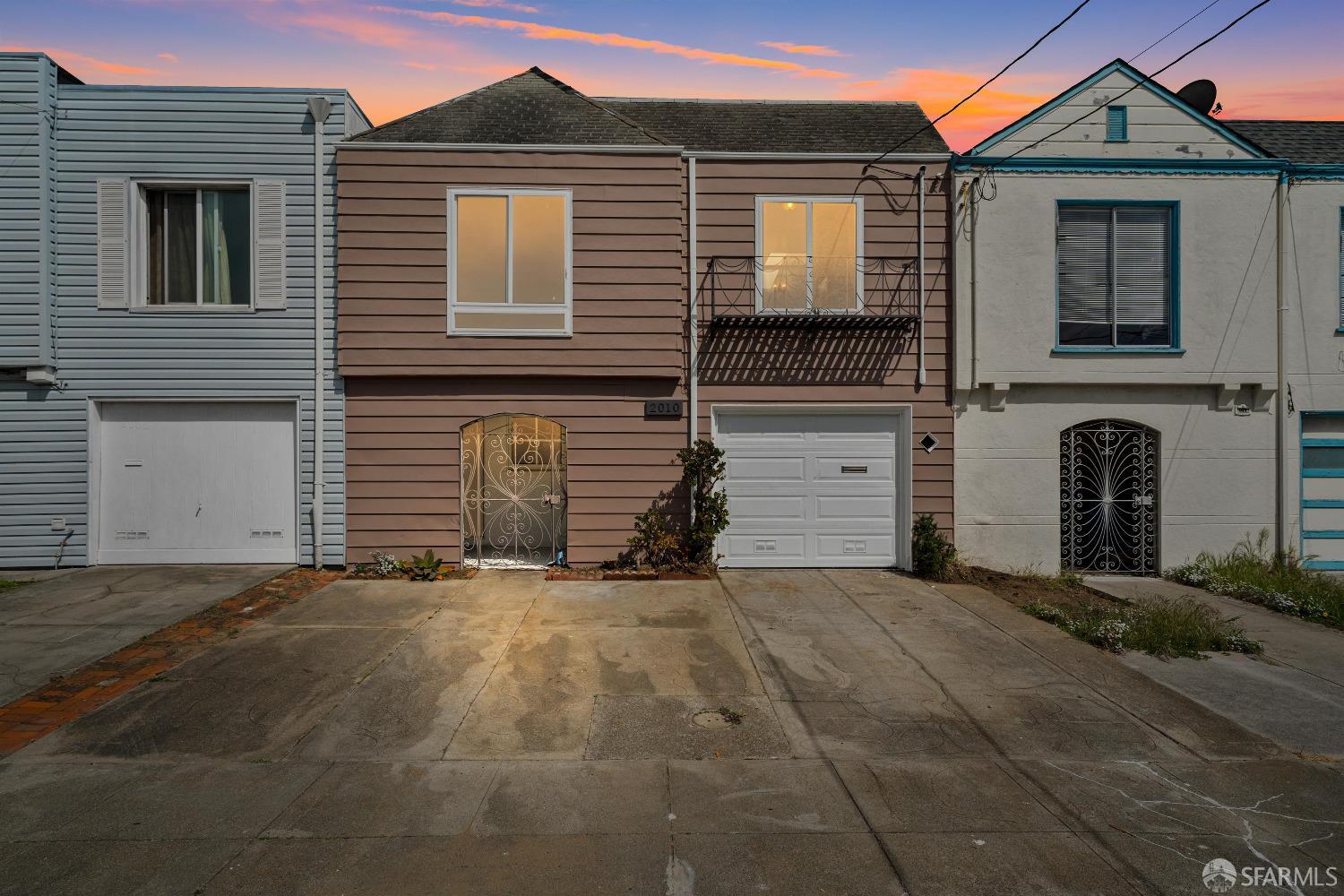 2010 32nd Avenue San Francisco, CA 94116 - Photo 1 of 1 a front view of a house with a garage