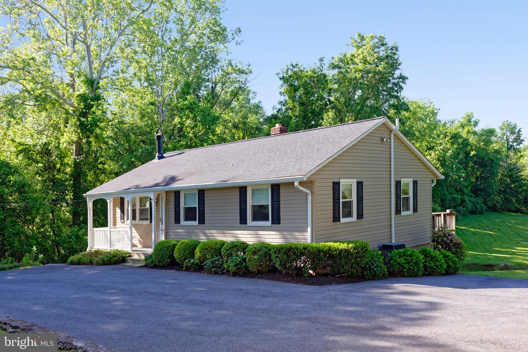34743 Welbourne Road Middleburg, VA 20117 - Photo 3 of 5 Paved driveway and mature landscaping.