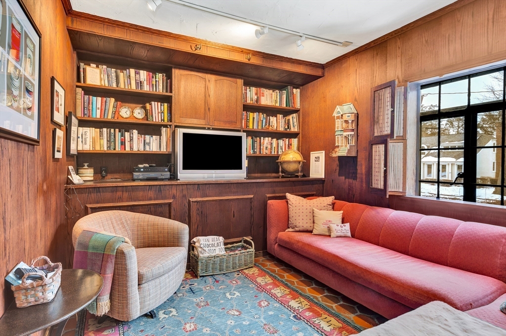127 Gordon Road Newton, MA 02468 - Photo 19 of 24 a living room with furniture fireplace and a flat screen tv
