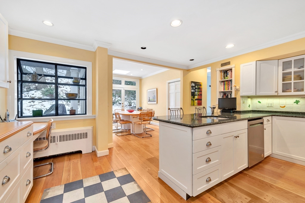 127 Gordon Road Newton, MA 02468 - Photo 10 of 24 a kitchen with granite countertop a sink and a stove