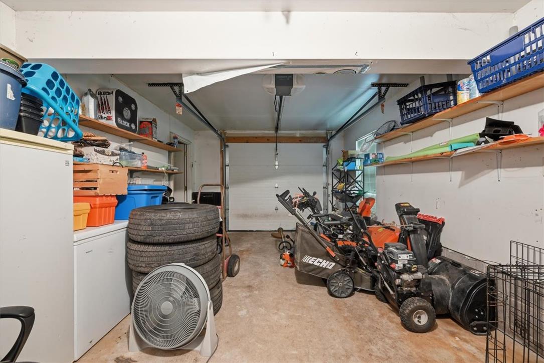 128 Chestnut Street Dingmans Ferry, PA 18328 - Photo 28 of 43 A spacious, clean garage provides ample room for storage and vehicle parking.