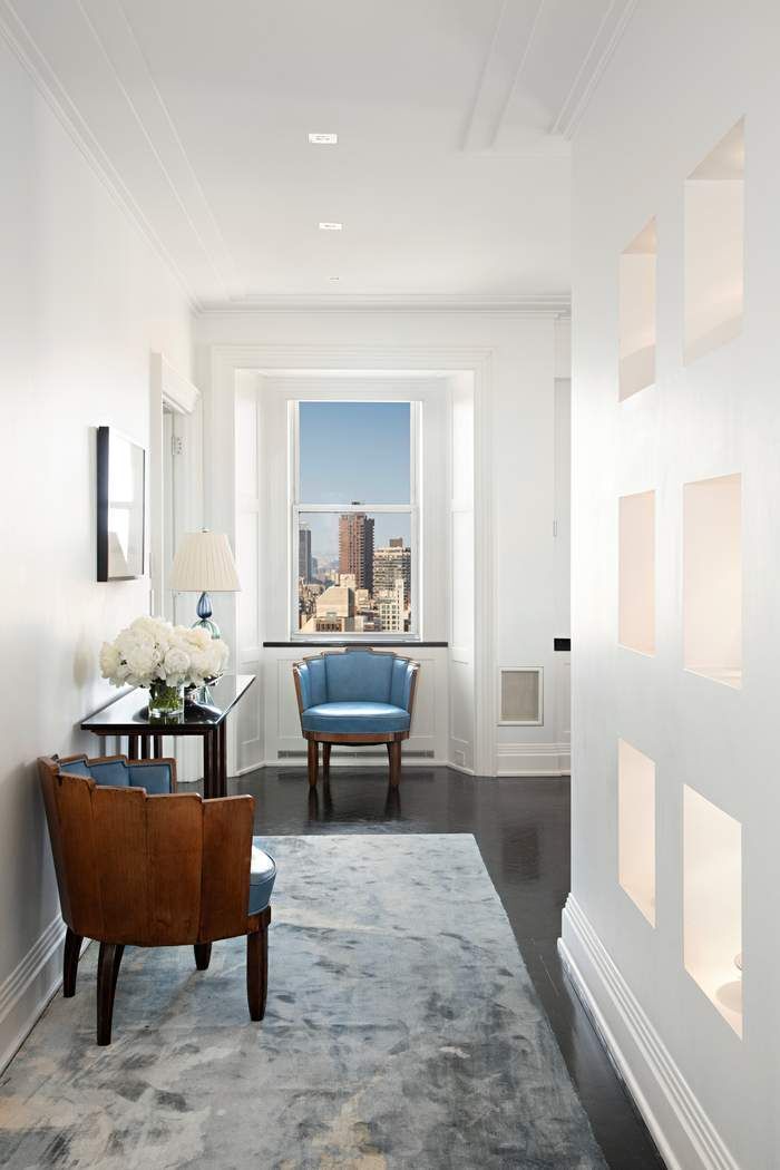 35 East 76th Street, Unit PH3407 Manhattan, NY 10021 - Photo 11 of 23 a living room with furniture and a couch