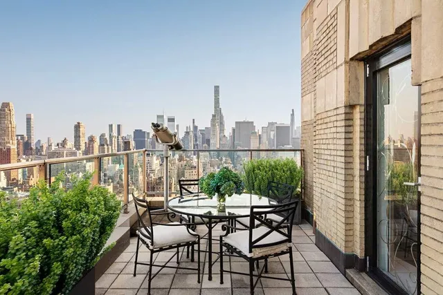 a view of a lake from a balcony