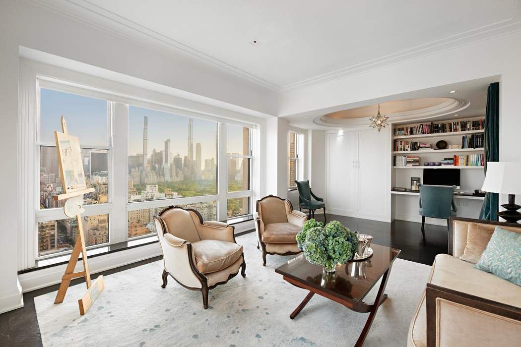 35 East 76th Street, Unit PH3407 Manhattan, NY 10021 - Photo 4 of 23 a living room with furniture and a large window