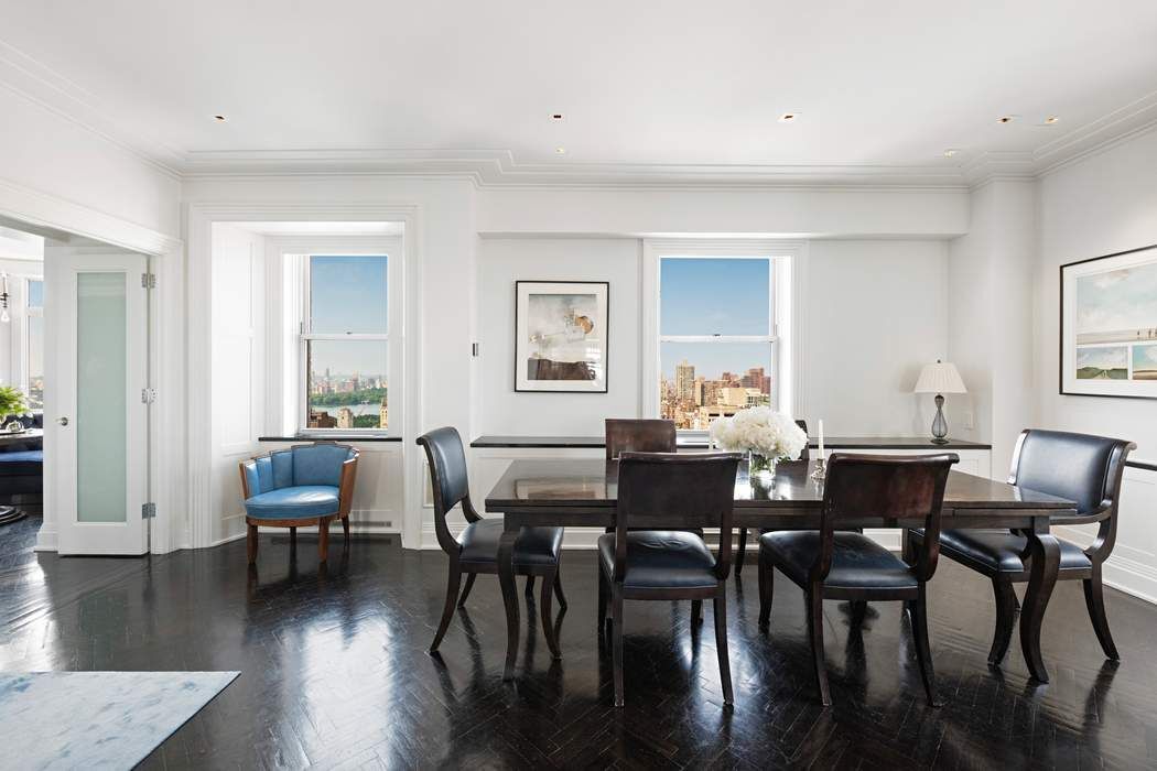 35 East 76th Street, Unit PH3407 Manhattan, NY 10021 - Photo 8 of 23 a view of a dining room with furniture and wooden floor