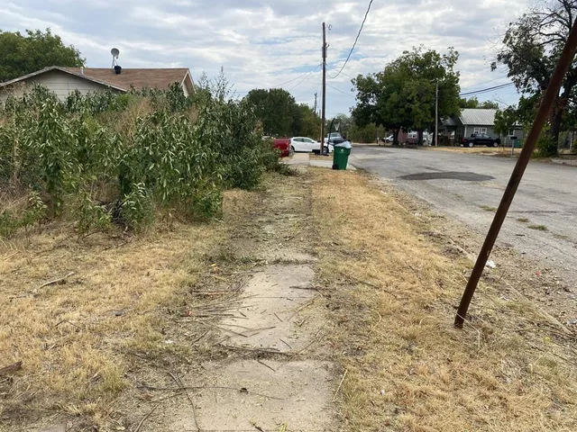 a view of a yard with a slide