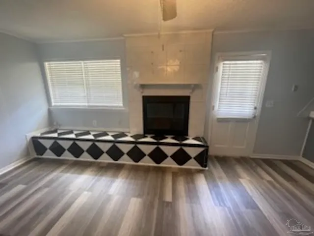 a bathroom with a black and white checkered floor