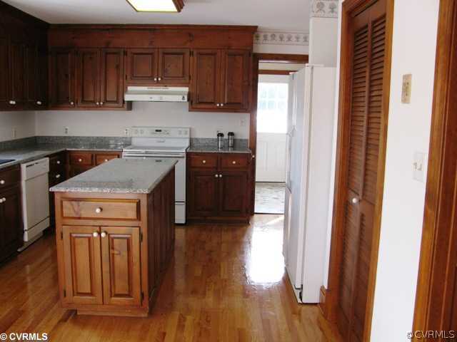 10590 Cedar Ridge Lane Prince George, VA 23875 - Photo 7 of 11 Kitchen - kitchen with granite countertops and isl