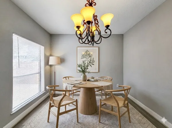 a table and chairs in a room