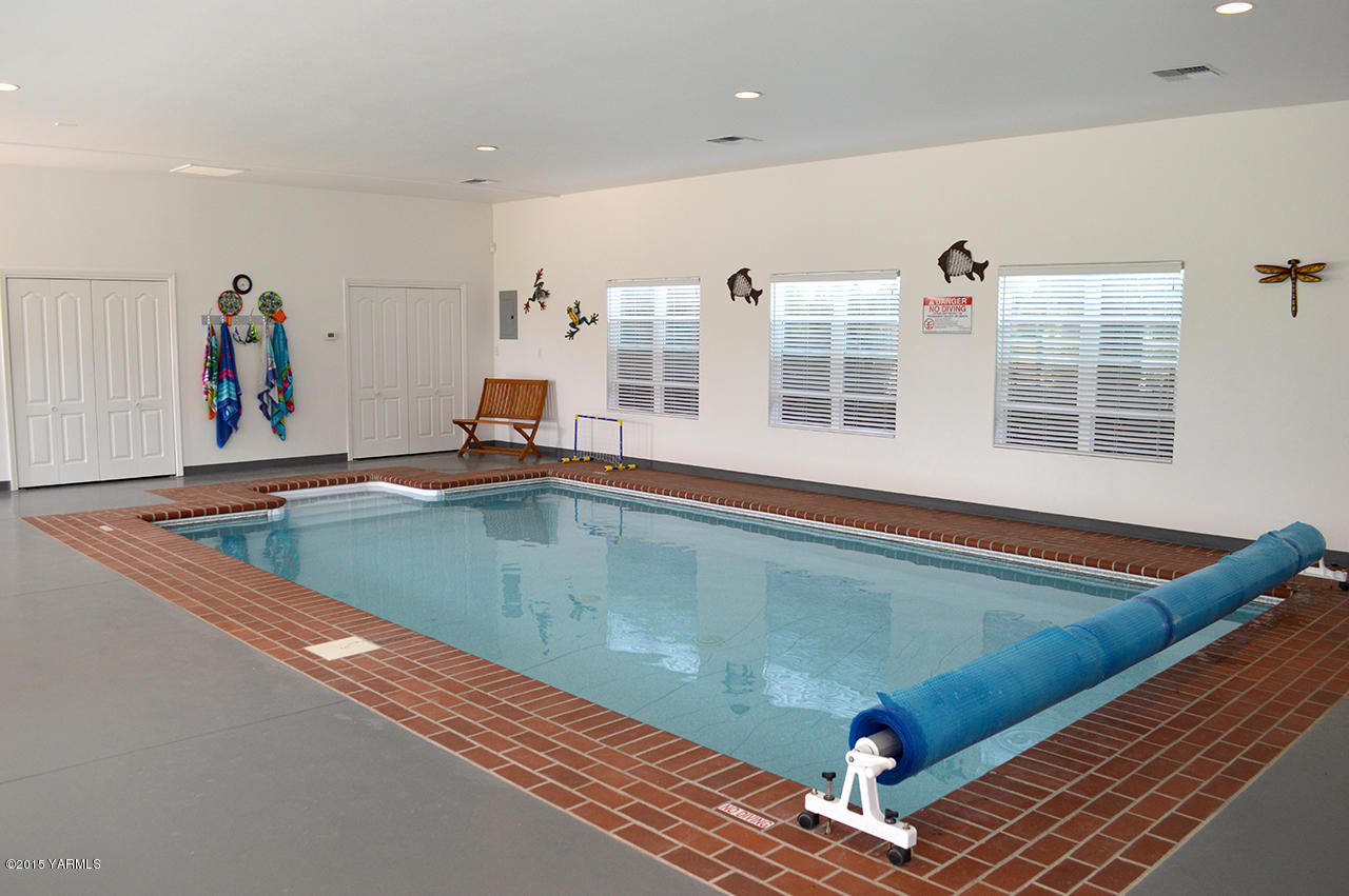 8104 Rutherford Road Yakima, WA 98903 - Photo 36 of 42 a room with pool table and windows