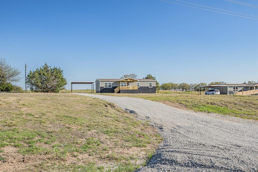 2031 Denver Road Sunset, TX 76270 - Photo 11 of 36 View of front of property featuring driveway