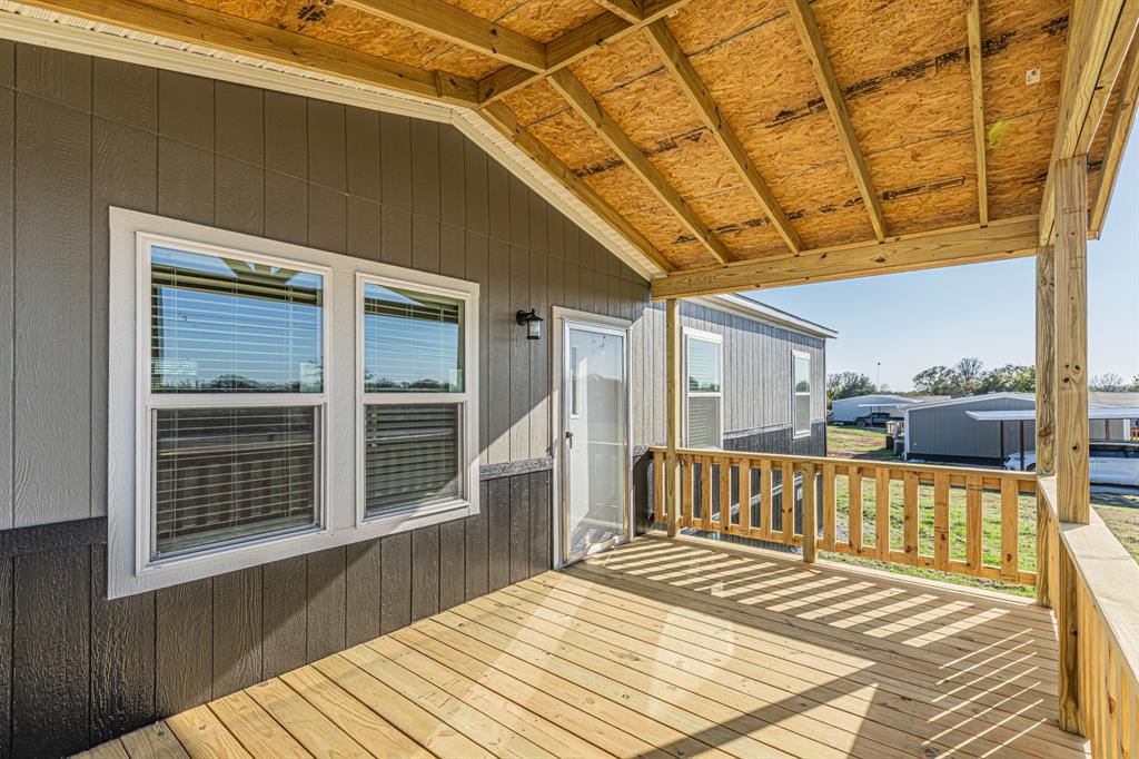2031 Denver Road Sunset, TX 76270 - Photo 7 of 36 View of wooden deck
