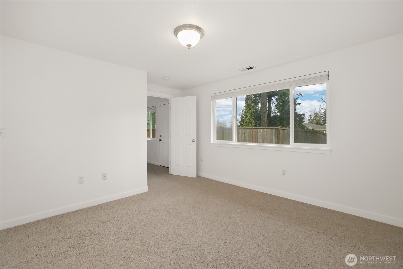 2403 B Street Steilacoom, WA 98388 - Photo 12 of 30 an empty room with windows