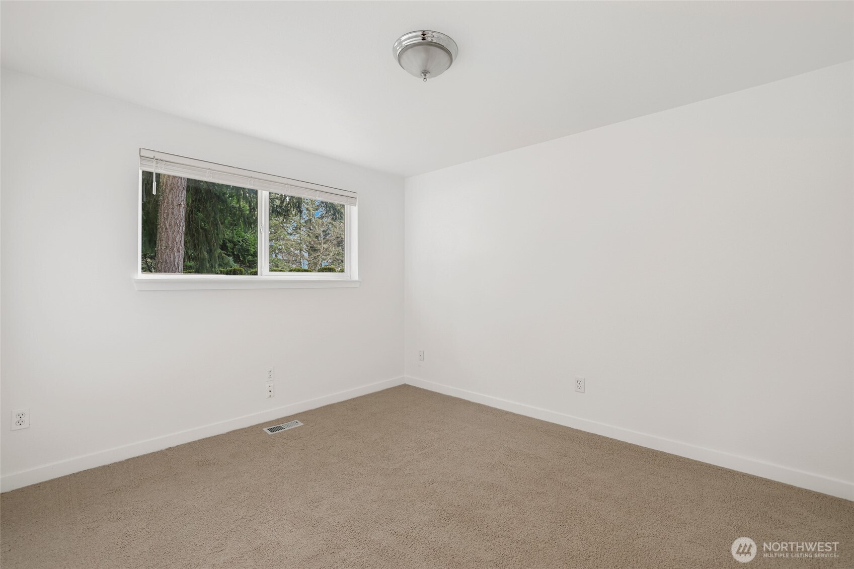 2403 B Street Steilacoom, WA 98388 - Photo 17 of 30 an empty room with windows