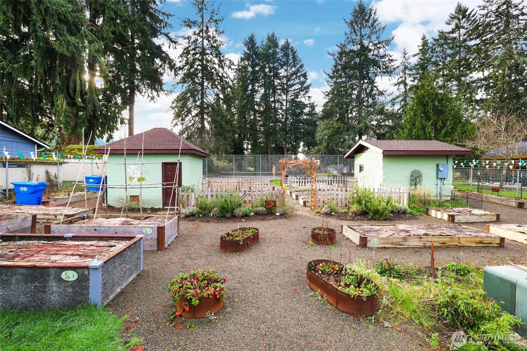 2403 B Street Steilacoom, WA 98388 - Photo 29 of 30 a view of a patio with table and chairs under an umbrella