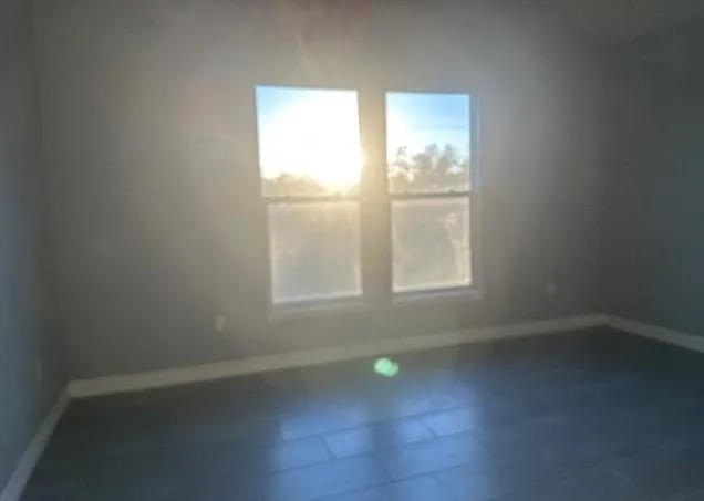 an empty room with a window